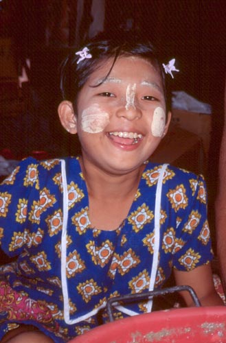 Many Burmese women and girls apply this makeup to their faces.