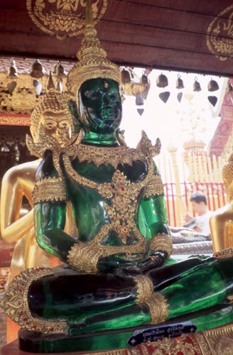 This glass Buddha is patterned after the famous Emerald Buddha, now in Bangkok.